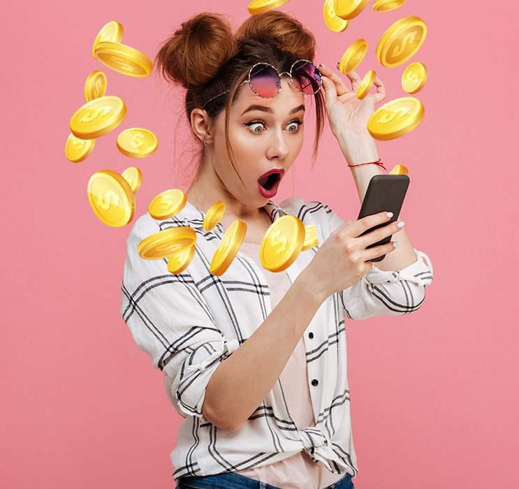 Female craps winner in pigtails is in shock while looking at her phone